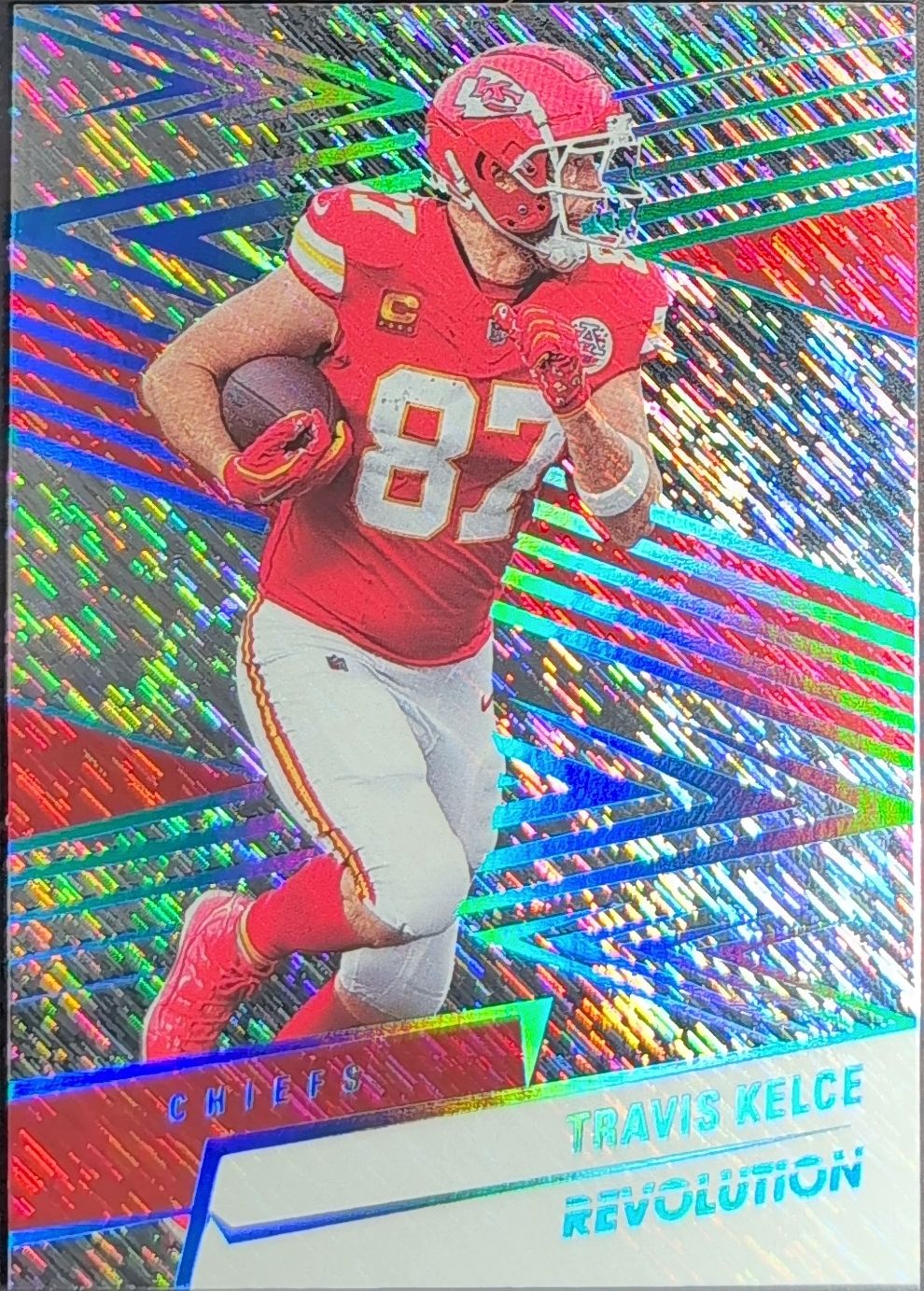2025 Panini Revolution Travis Kelce #94 Blue Storm SN Kansas City Chiefs front