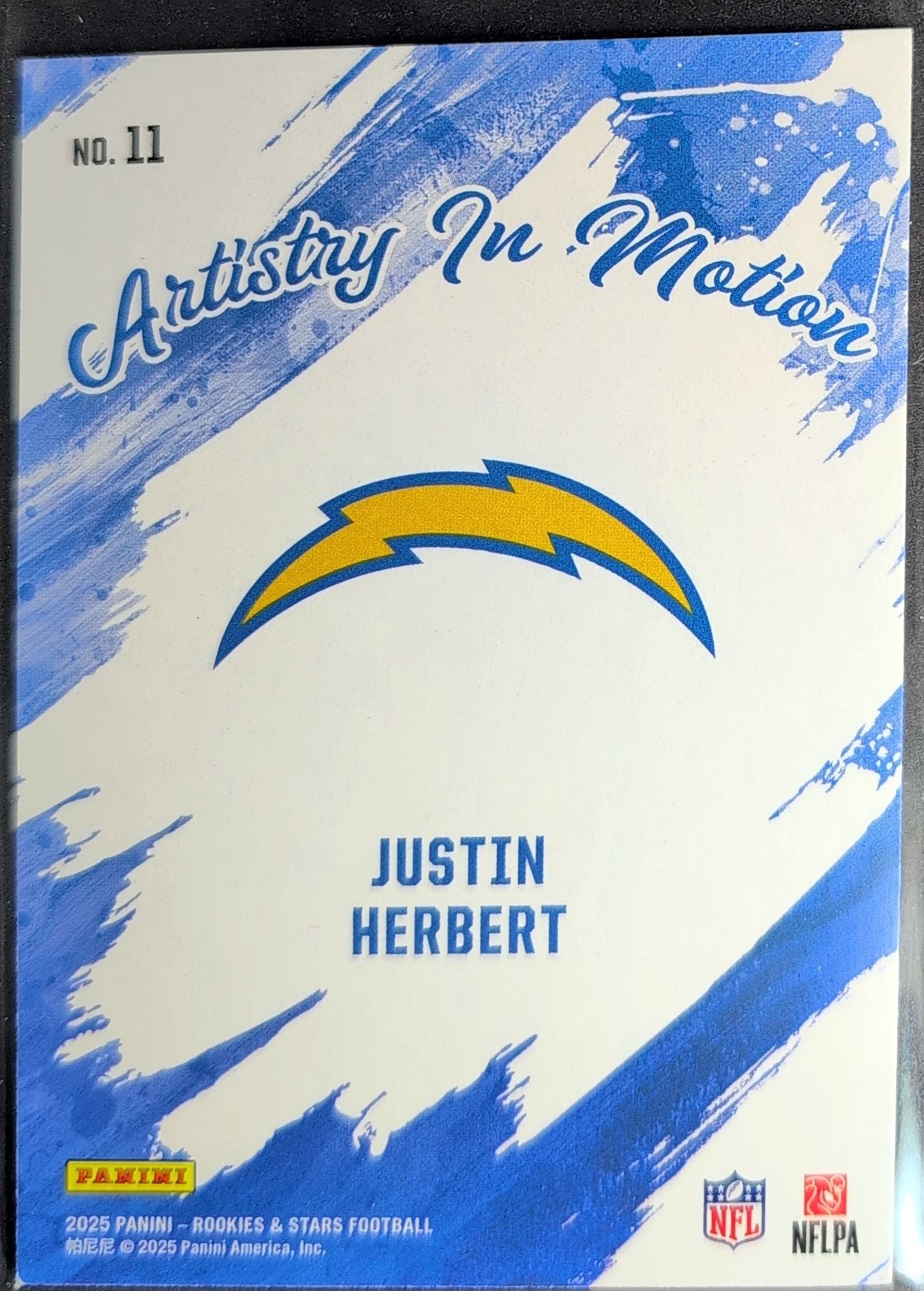 2025 Panini Rookies & Stars Justin Herbert #11 Artistry in Motion Los Angeles Chargers back